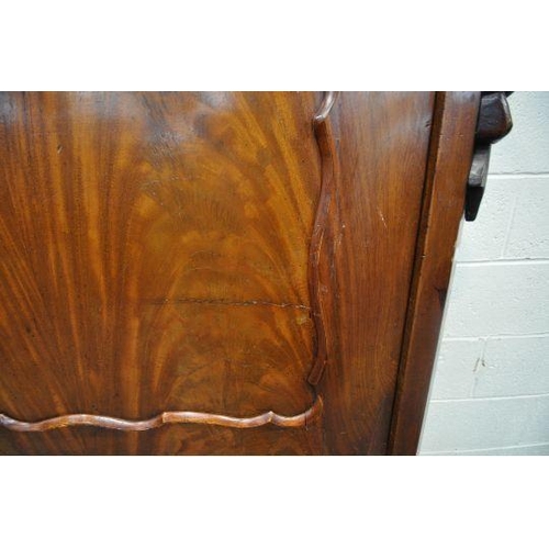 1197 - A VICTORIAN MAHOGANY ESCRITOIRE, with a single drawer, the fall front door enclosing a fitted interi... 