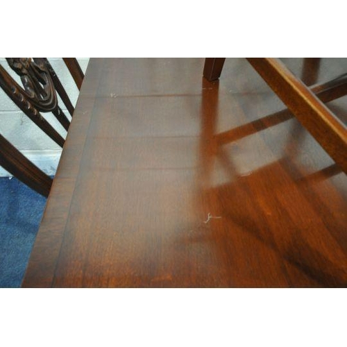 1198 - A REPRODUX MAHOGANY TWIN PEDESTAL EXTENDING DINING TABLE, with one additional leaf, extended length ... 