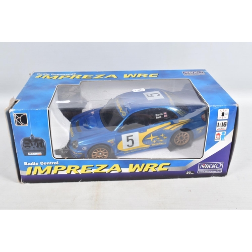 15 - A BOXED NIKKO RADIO CONTROL SUBARU IMPREZA WRC CAR, No.RDC 160009 Design - A, 1/16 scale, not tested... 