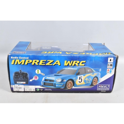 15 - A BOXED NIKKO RADIO CONTROL SUBARU IMPREZA WRC CAR, No.RDC 160009 Design - A, 1/16 scale, not tested... 