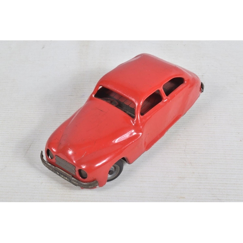 22 - AN UNBOXED CHAD VALLEY TINPLATE CLOCKWORK CAR, red body, black and red interior, with reg. no. CV100... 