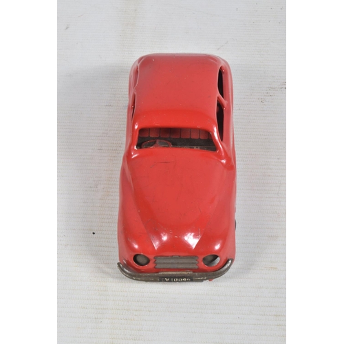 22 - AN UNBOXED CHAD VALLEY TINPLATE CLOCKWORK CAR, red body, black and red interior, with reg. no. CV100... 