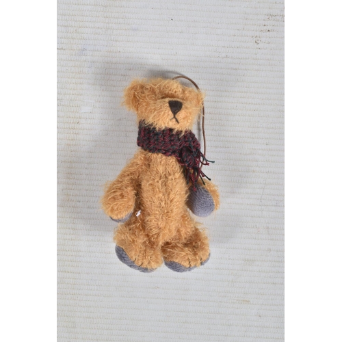 23 - AN UNBOXED MODERN STEIFF BEAR, No.029561, complete with button and yellow tag to left ear and in ver... 