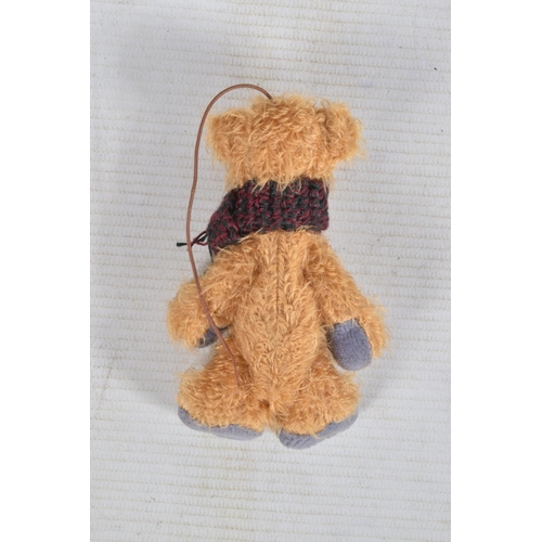 23 - AN UNBOXED MODERN STEIFF BEAR, No.029561, complete with button and yellow tag to left ear and in ver... 