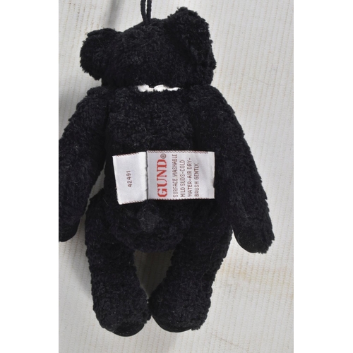 23 - AN UNBOXED MODERN STEIFF BEAR, No.029561, complete with button and yellow tag to left ear and in ver... 