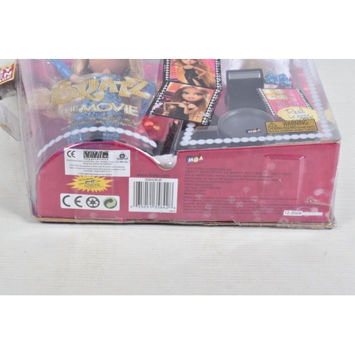 29 - FIVE BOXED COLLECTIBLE DOLLS OF VARIOUS BRANDS, to include a MGA Bratz The Movie Doll 'Chloe' with r... 