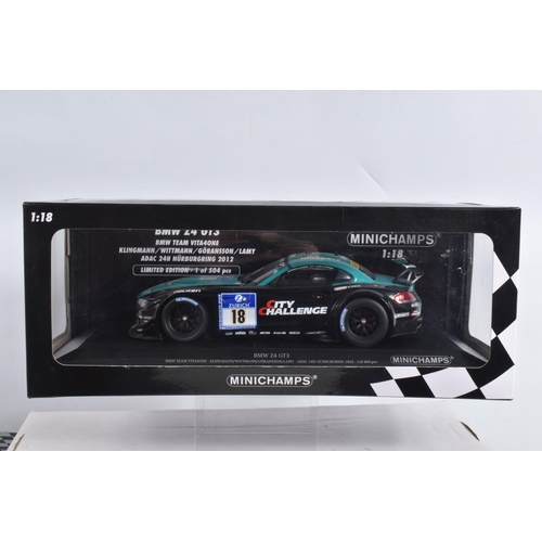 46 - FOUR BOXED 1:18 SCALE DIECAST MODEL SPORTS CARS, to include a  Redbull BMW M4 DTM 2016, a Minichamps... 