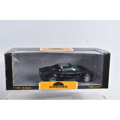 57 - A COLLECTION OF BOXED AND UNBOXED  1:18 SCALE MODEL DIECAST CARS, to include two unboxed Road Signat... 