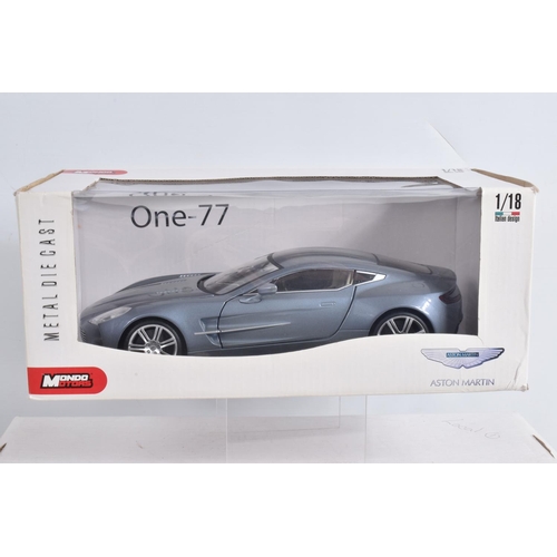 57 - A COLLECTION OF BOXED AND UNBOXED  1:18 SCALE MODEL DIECAST CARS, to include two unboxed Road Signat... 