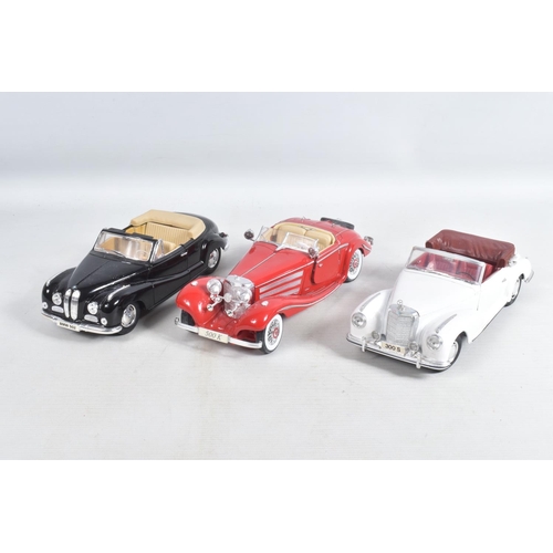 58 - A QUANTITY OF UNBOXED MODEL DIECAST SPORT VEHICLES, to include a Maisto 1955 BMW 502 in black, Maist... 