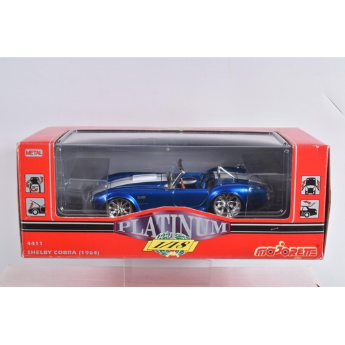 60 - A COLLECTION OF BOXED AND UNBOXED DIECAST MODEL AMERICAN MUSCLE CARS, to include 4 unboxed models, a... 