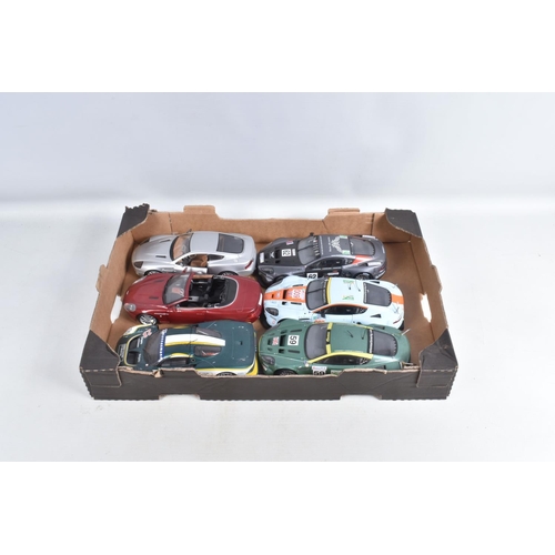 62 - A QUANTITY OF UNBOXED MODEL DIECAST SPORT VEHICLES, to include a Kentoys 1:24 BMW Mini Cooper in red... 