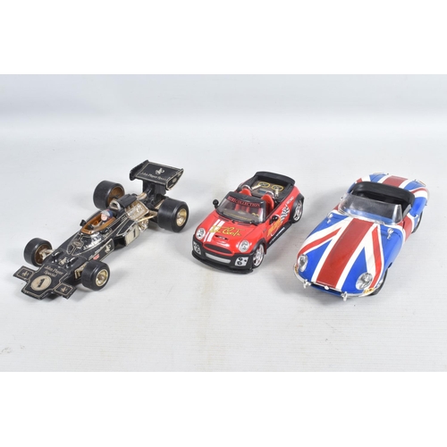 62 - A QUANTITY OF UNBOXED MODEL DIECAST SPORT VEHICLES, to include a Kentoys 1:24 BMW Mini Cooper in red... 