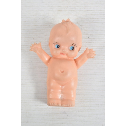 71 - THREE VINYL KEWPIE DOLLS, smallest one marked  'M350? Combex Made in England' to base, other two hav... 