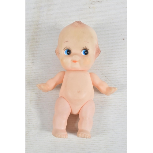 71 - THREE VINYL KEWPIE DOLLS, smallest one marked  'M350? Combex Made in England' to base, other two hav... 