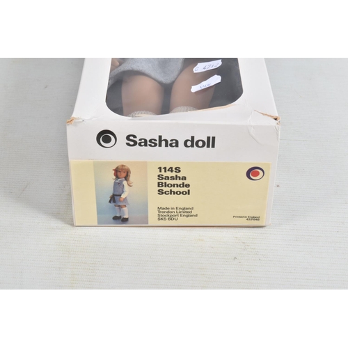 72 - A BOXED TRENDON SASHA DOLL 'Sasha' in School uniform, No.114S, blonde hair, white blouse, grey pinaf... 