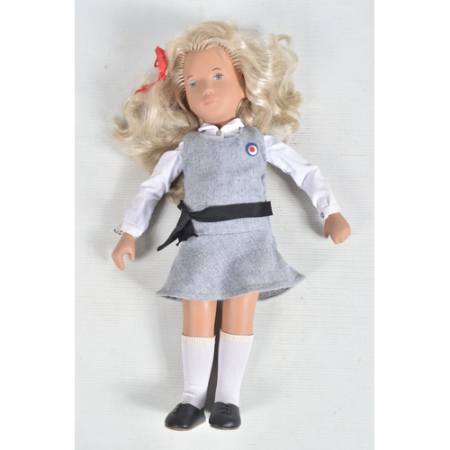 72 - A BOXED TRENDON SASHA DOLL 'Sasha' in School uniform, No.114S, blonde hair, white blouse, grey pinaf... 