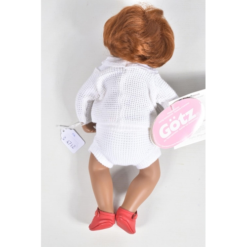 74 - AN UNBOXED SASHA GOTZ MORGENTHALER BABY DOLL, No.9640203, brown hair, white jumper and shorts, with ... 