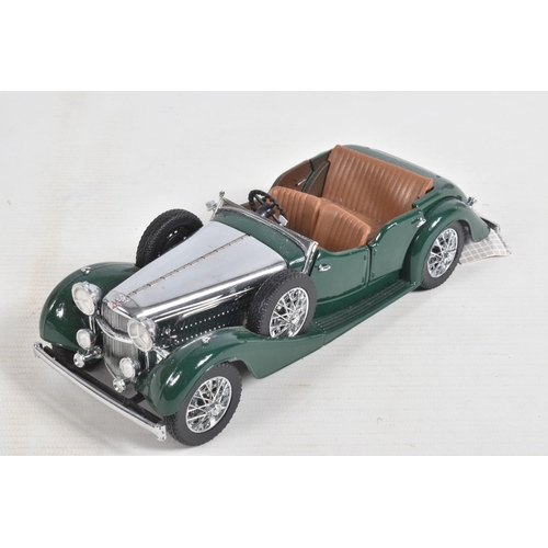 82 - FOUR DANBURY MINT AND  FRANKLIN MINT DIECAST MODEL CARS,  to include a Franklin Mint Jaguar SS-100 w... 