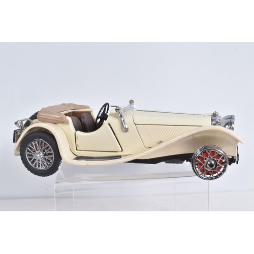 82 - FOUR DANBURY MINT AND  FRANKLIN MINT DIECAST MODEL CARS,  to include a Franklin Mint Jaguar SS-100 w... 