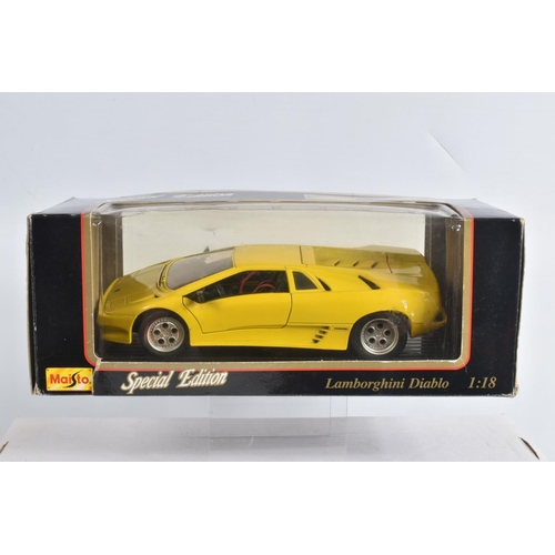 90 - A COLLECTION OF BOXED AND UNBOXED 1:18 SCALE DIECAST MODEL  VEHICLES, to include 4 unboxed models, a... 