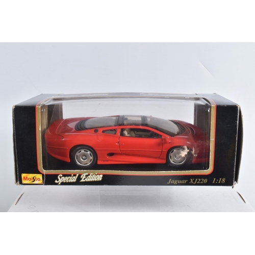 90 - A COLLECTION OF BOXED AND UNBOXED 1:18 SCALE DIECAST MODEL  VEHICLES, to include 4 unboxed models, a... 