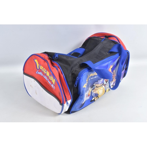 96 - A COLLECTION OF POKEMON COLLECTIBLES, to include a  'Gotta Catch'em all! bag, a lunchbox filled with... 