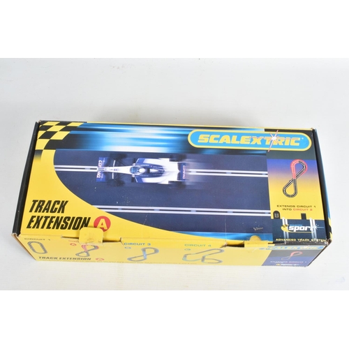 98 - A BOXED SCALEXTRIC SPORT ADVANCED TRACK SYSTEM RACE KIT WITH TRACK EXTENSTION PACKS,  with Grand Pri... 