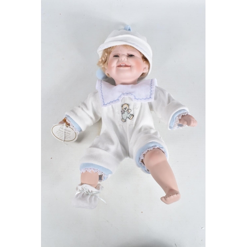 117 - TWO UNBOXED LEONARDO COLLECTION PORCELAIN BABY DOLLS, 'Camilla' complete with name swing tag, anothe... 