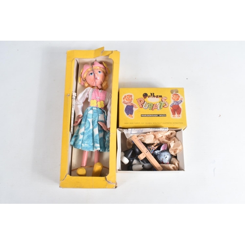 129 - A QUANTITY OF ASSORTED TOYS, boxed Pelham Puppets SS Tyrolean Girl and Black Cat, both appear comple... 