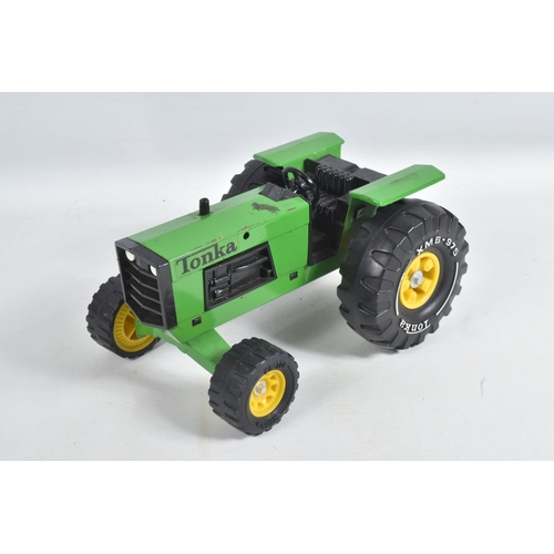 135 - A QUANTITY OF TONKA TOYS TRACTORS, from 1970's onwards, includes two with front loading shovels, wit... 