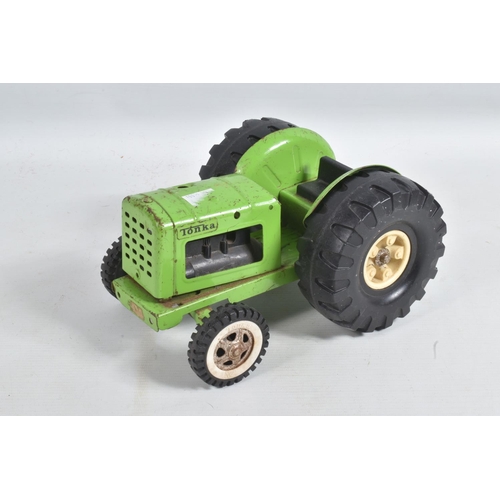 135 - A QUANTITY OF TONKA TOYS TRACTORS, from 1970's onwards, includes two with front loading shovels, wit... 