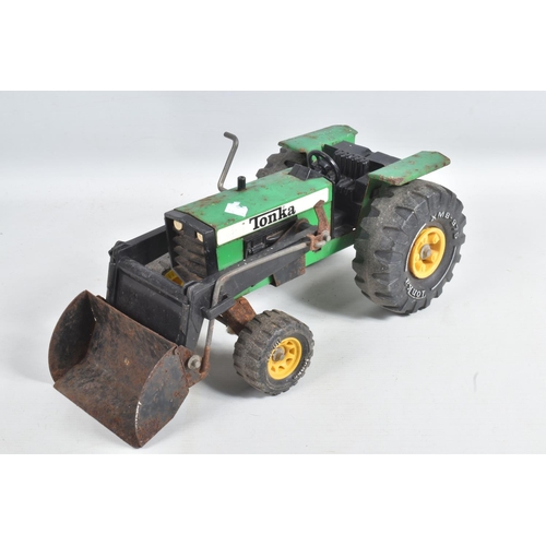 135 - A QUANTITY OF TONKA TOYS TRACTORS, from 1970's onwards, includes two with front loading shovels, wit... 