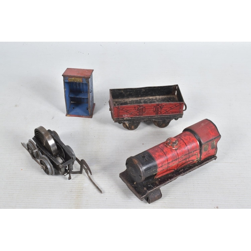 139 - A QUANTITY OF UNBOXED AND ASSORTED HORNBY O GAUGE FREIGHT ROLLING STOCKAND ACCESSORIES, to include N... 