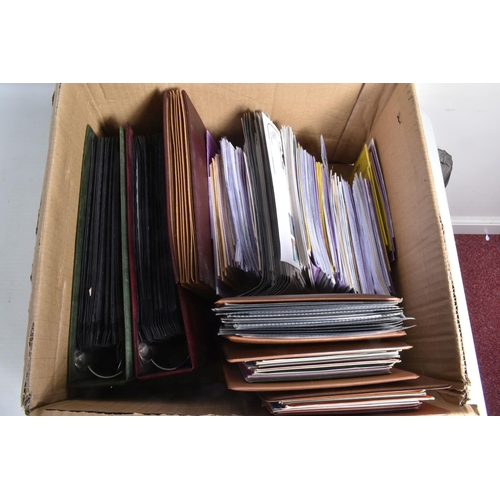 217 - 2 BOXES WITH A CLEAROUT OF STAMPS IN PACKETS AND ALBUMS. Includes IOM fdcs and presentation packs, a... 