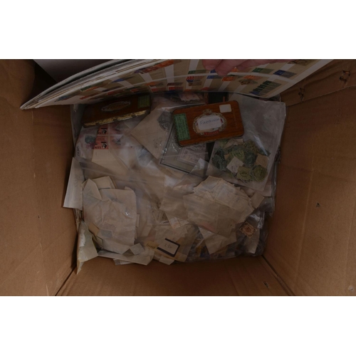 217 - 2 BOXES WITH A CLEAROUT OF STAMPS IN PACKETS AND ALBUMS. Includes IOM fdcs and presentation packs, a... 