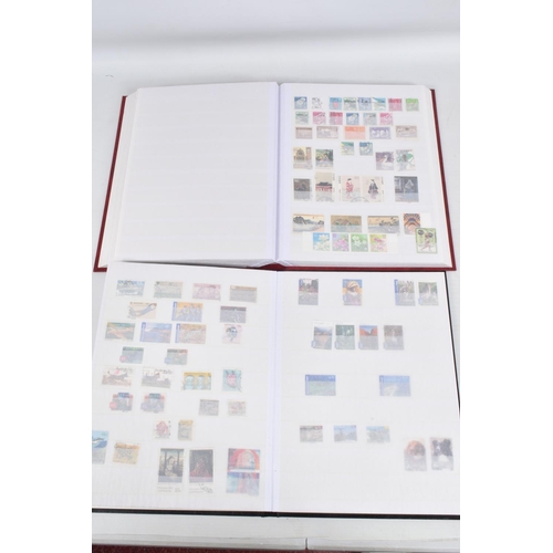 220 - LARGE COLLECTION OF STAMPS IN 2 BOXES, A TIN AND 2 BAGS. WORLDWIDE CONTENT WITH MAIN VALUE IN GB MIN... 