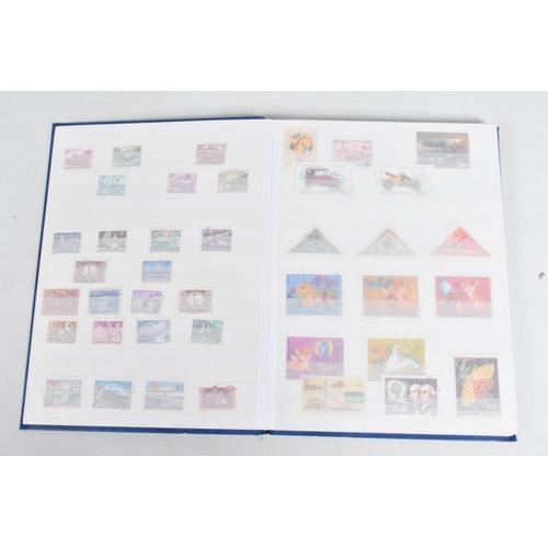 220 - LARGE COLLECTION OF STAMPS IN 2 BOXES, A TIN AND 2 BAGS. WORLDWIDE CONTENT WITH MAIN VALUE IN GB MIN... 