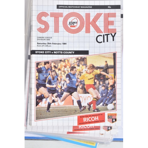 222 - A COLLECTION OF STOKE CITY FOOTBALL CLUB PROGRAMMES PRESENTED IN A BINDER, programmes range from 196... 