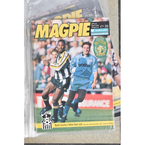 243 - A COLLECTION OF NOTTS COUNTY FOOTBALL CLUB PROGRAMMES, programmes range from 1956 to 2005, featuring... 