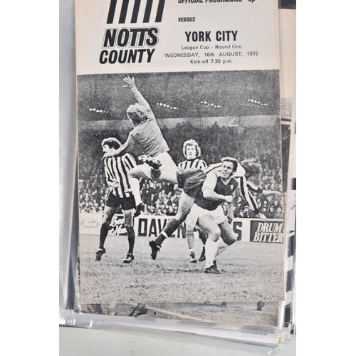 243 - A COLLECTION OF NOTTS COUNTY FOOTBALL CLUB PROGRAMMES, programmes range from 1956 to 2005, featuring... 