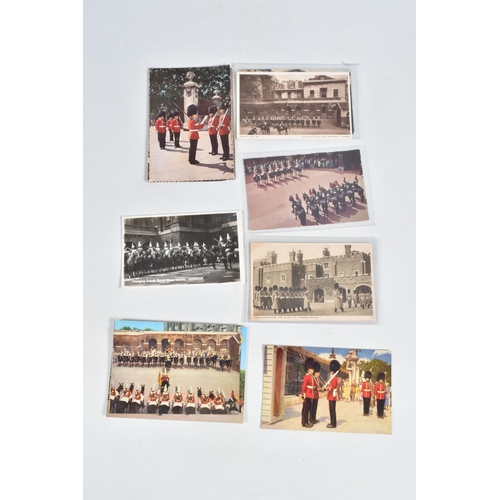 262 - A COLLECTION OF POSTCARDS RELATING TO THE ROYAL FAMILY AND THE MILITARY, includes six albums and 1 c... 