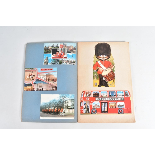 262 - A COLLECTION OF POSTCARDS RELATING TO THE ROYAL FAMILY AND THE MILITARY, includes six albums and 1 c... 