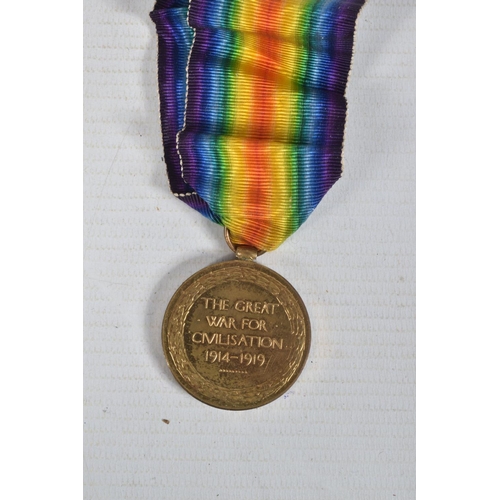 264 - A FIFTEENTH LONDON REGIMENT PAIR OF WWI MEDALS AND SOME CLOTH INSIGNA, the medals are correctly name... 