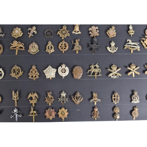 267 - A COLLECTION OF OVER ONE HUNDRED CAP AND COLLAR BADGES FROM VARIOUS ERAS OF THE 20TH CENTURY, this v... 