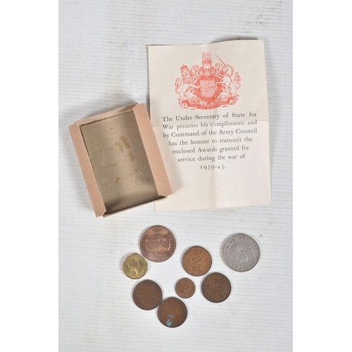 270 - TWO WWII MEDALS AND A SMALL AMOUNT OF COINS, the medals consist of a 1939-1945 war medal and a defen... 