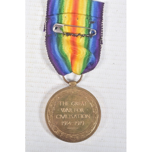 276 - FIVE WWI MEDALS AND SOME CAP BADGES, the medals include a 1914-15 star trio named to 14394 Thomas Wh... 