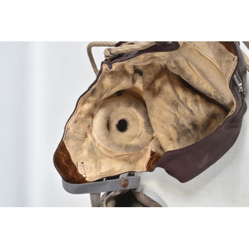 280 - A LEATHER RAF MID WWII LEATHER FLYING HELMET, together with goggles, The main construction of the he... 