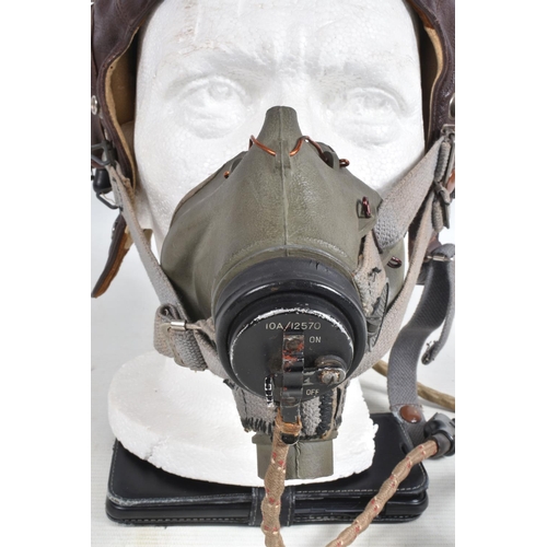 280 - A LEATHER RAF MID WWII LEATHER FLYING HELMET, together with goggles, The main construction of the he... 