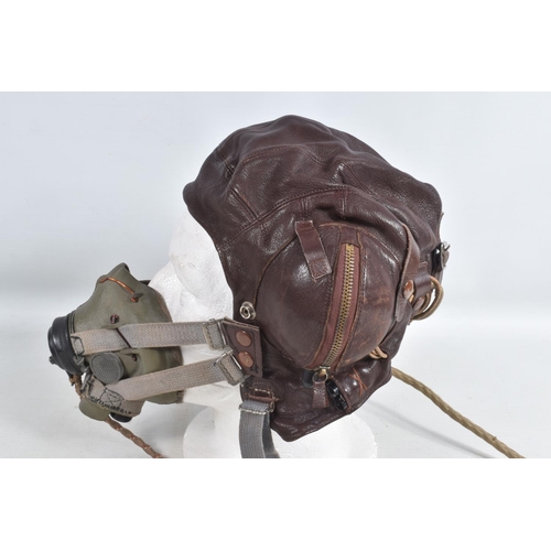 280 - A LEATHER RAF MID WWII LEATHER FLYING HELMET, together with goggles, The main construction of the he... 